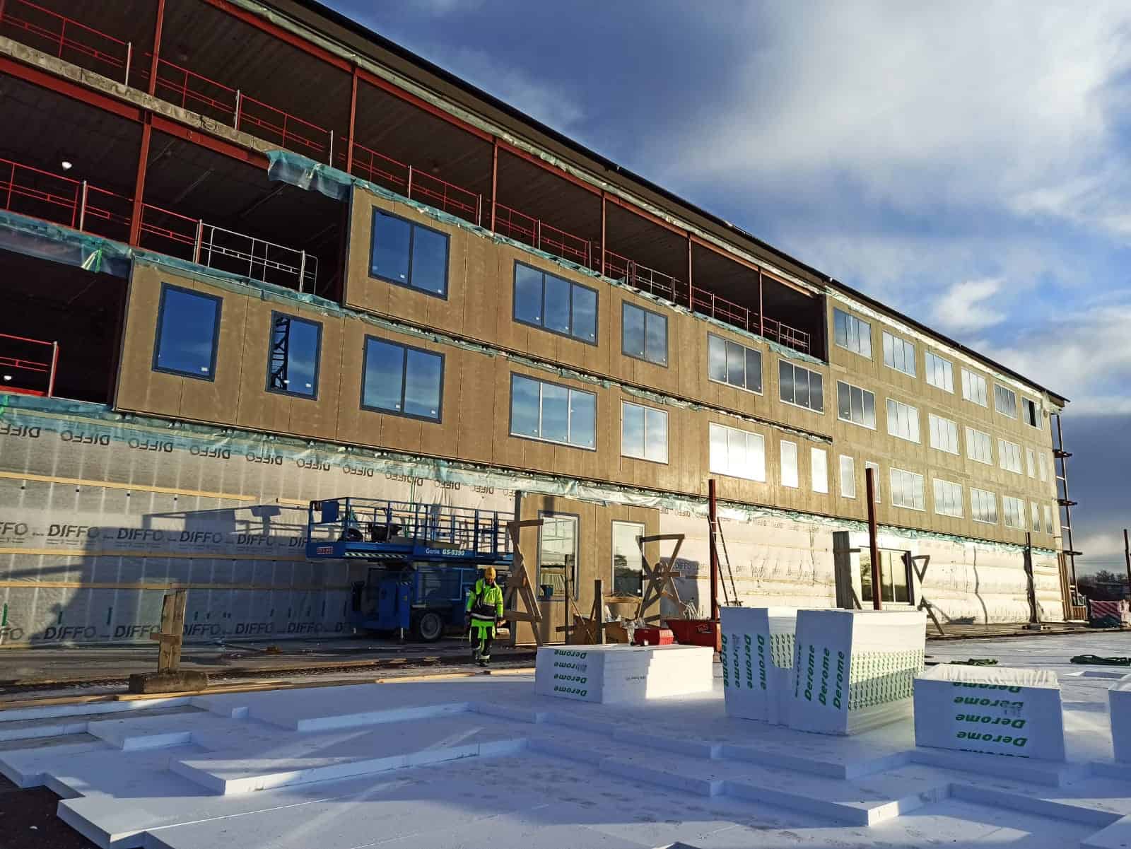 Insulated building facade panels or infill panels apartment building in Sweden